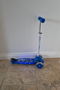 Blue light up 3 wheel scooter