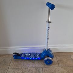 Blue light up 3 wheel scooter