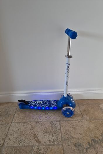 Blue light up 3 wheel scooter