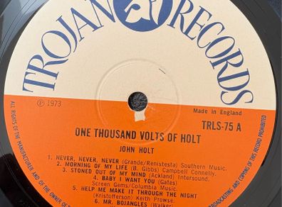 John Holt - One thousand Volts of Holt. Trojan Records, 1973. No cover. Has marks and a bit of crackle but plays very recently. Bargain.