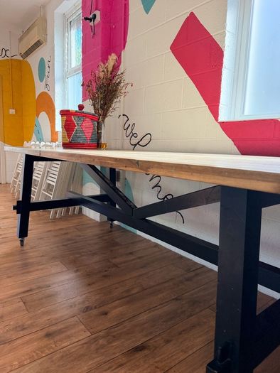 Solid wooden dining table - can seat up to 10