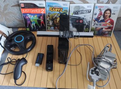 Nintendo Wii with steering wheel, HDMI adapter, 4 games