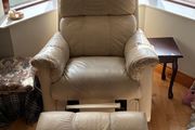 Matching cream two-seater sofa and reclining armchair