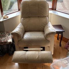 Matching cream two-seater sofa and reclining armchair