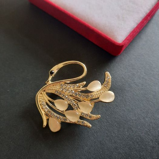 Elegant Gold Tone Swan Brooch with Champagne Color Cat Eye Stones and Crystal Pave Wings Vintage Style Bird Pin