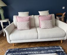 Fama 2 seater sofa and swivel chair