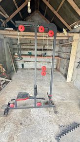 Plate loaded lat pull down machine