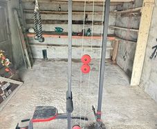 Plate loaded lat pull down machine