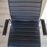 Black ribbed office chair with chrome base Image 2