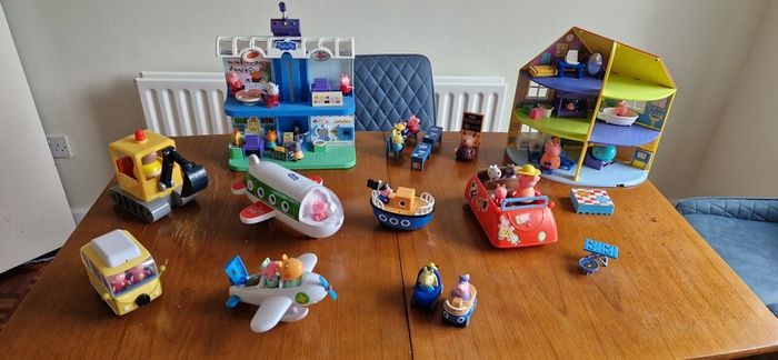 Assortment of peppa pig toys