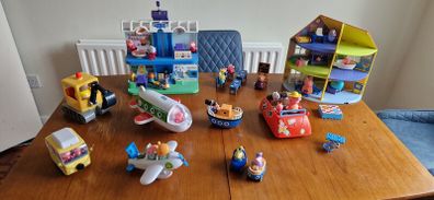 Assortment of peppa pig toys