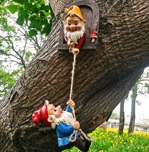 Gnome climbing statues for tree