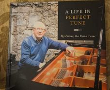 A Life In Perfect Tune. My Father The Piano Tuner. By Anthony Woods. Signed First Edition Large Volume Hardback In Very Good Condition.