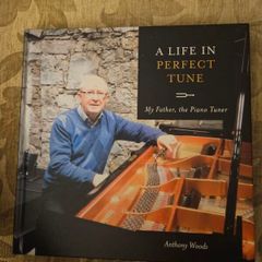 A Life In Perfect Tune. My Father The Piano Tuner. By Anthony Woods. Signed First Edition Large Volume Hardback In Very Good Condition.