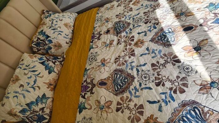 Bed cover with pillow covers