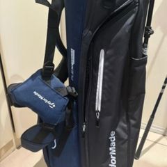 NEW - TaylorMade FlexTech Stand Bag (Black/Blue), stand legs still have the factory wrapping on them.