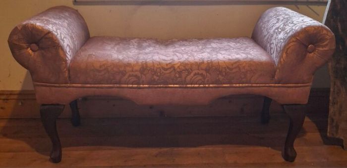 very old small type sofa