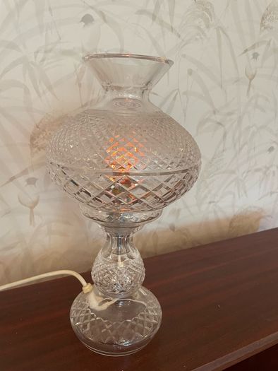 Elegant vintage cut glass electric table lamp in a classic hurricane