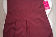 New school pinafore size 12-13 yrs