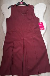 New school pinafore size 12-13 yrs