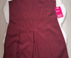 New school pinafore size 12-13 yrs