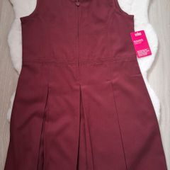 New school pinafore size 12-13 yrs