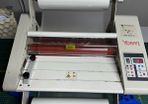 Roll fed laminator