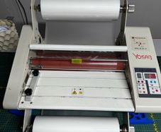 Roll fed laminator