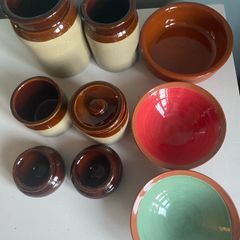Selection of stoneware jars and condiment holders and Three little dishes added