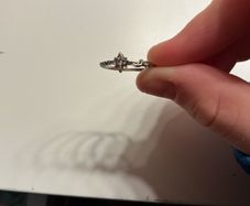 Silver tone star design ring