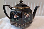 Vintage hexagon gold and black teapot