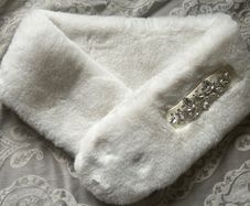 Faux fur scarf with jewel detail