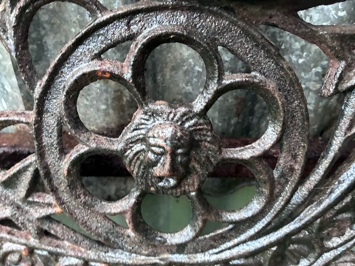 Pair of decorative cast iron bench ends