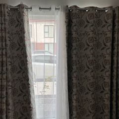 Full set of curtains, net curtains and curtain rods.