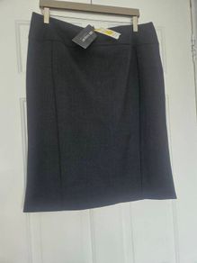 Ladies new Autograph grey skirt ,knee length  size 16 bnwt. Original price tag still attached for e55. Also comes with M&S collection ladies mustard blouse size 14 petite bnwt Price reduction