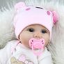 Realistic Reborn Dolls 22inch 55cm Lifelike Baby Dolls Soft Silicone Vinyl Weighted Cloth Body with Feeding Kit Reborn Dolls Girls Image 2