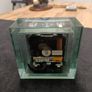 This is an Acctim Hamilton mantel clock made of glass and metal. Image 4