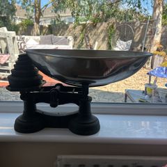 old weighing scales with weights