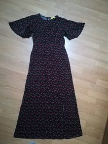 Never worn beautiful dress with a slit