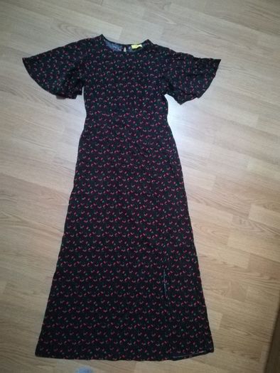 Never worn beautiful dress with a slit