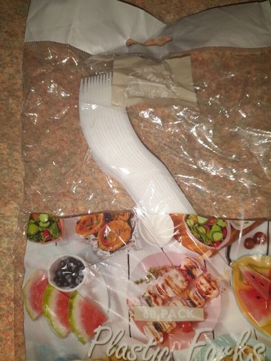 Plastic spoons knifes and forks