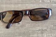 Vintage Ray-Ban sunglasses, Made in USA, with B&amp;L engraved lenses and brown tortoiseshell frame. Lenses are in good condition, frame shows signs of wear. Please see all photos for details.