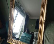 Gold affect mirror. Looks antique.