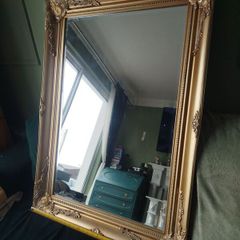Gold affect mirror. Looks antique.