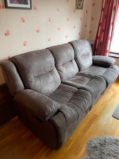 Three seater reclining sofa