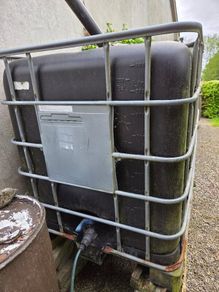 Water Tank including metal cage