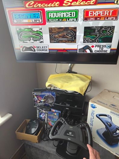Sega Saturn w/ 3D Control Pad, Arcade Racer, Lightgun and Games