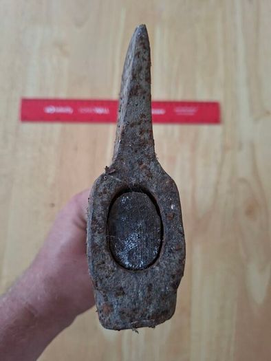Old hatchet, hand axe.