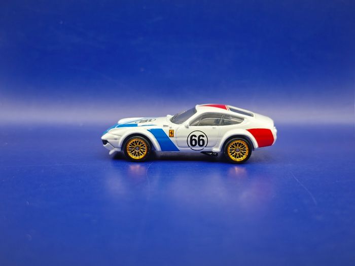 Hot Wheels Ferrari 365 GTB4 C with custom wheels.