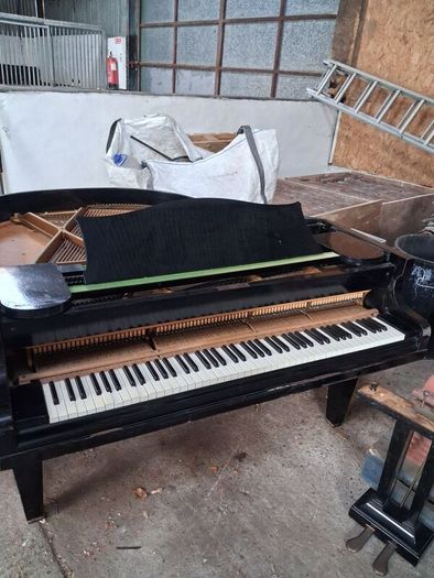 C. Bechstein baby grand piano